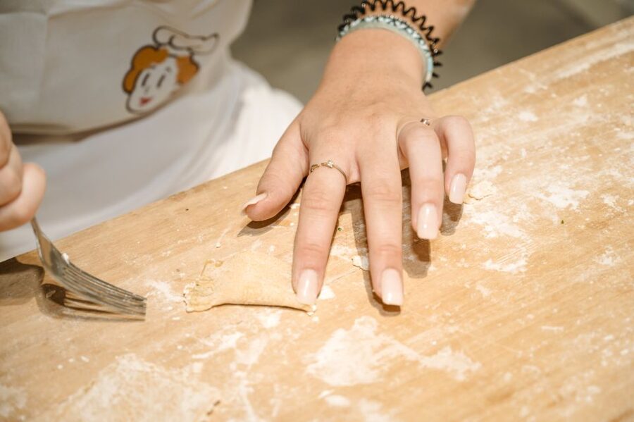 Vicenza: Pasta & Tiramisu Cooking Class at a Local's Home - Cooking pasta in a Vicenza home